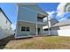 Two-story house with light blue siding and a balcony at 3829 71St N St, St Petersburg, FL 33709