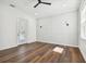 Spacious bedroom with wood floors and French doors leading to a balcony at 3829 71St N St, St Petersburg, FL 33709