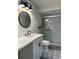 Updated bathroom with walk-in shower and modern vanity at 3963 Glen Oaks Manor Dr, Sarasota, FL 34232