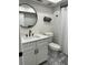 Contemporary bathroom with white vanity and modern fixtures at 3963 Glen Oaks Manor Dr, Sarasota, FL 34232