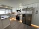 Modern kitchen with white cabinets and quartz countertops at 3963 Glen Oaks Manor Dr, Sarasota, FL 34232