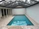 Inviting rectangular pool with a covered patio at 3963 Glen Oaks Manor Dr, Sarasota, FL 34232