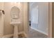 Elegant powder room with pedestal sink and modern fixtures at 5351 Bridge St # 38, Tampa, FL 33611