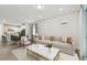 Inviting living room boasts modern decor, natural light, and an open floorplan with stylish accents at 9450 Shorebird Ct, Parrish, FL 34219