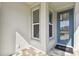 Inviting entryway featuring a stylish front door and tiled flooring at 9454 Shorebird Ct, Parrish, FL 34219