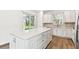 Well-designed kitchen features a spacious island and modern finishes at 9454 Shorebird Ct, Parrish, FL 34219