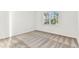 Bright bedroom features carpet, window and neutral paint at 9462 Shorebird Ct, Parrish, FL 34219