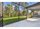 Screened in lanai and view of back yard at 9462 Shorebird Ct, Parrish, FL 34219