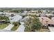 Aerial view of a house in a residential neighborhood at 10230 Old Tampa Bay Dr, San Antonio, FL 33576