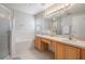 Main bathroom boasts double sinks, a soaking tub, and a shower at 10230 Old Tampa Bay Dr, San Antonio, FL 33576