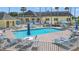 Relaxing community pool with patio furniture at 10230 Old Tampa Bay Dr, San Antonio, FL 33576
