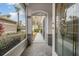 Entryway features a screened porch and decorative glass door at 10230 Old Tampa Bay Dr, San Antonio, FL 33576