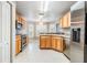 Kitchen boasts stainless steel appliances and ample counter space at 10230 Old Tampa Bay Dr, San Antonio, FL 33576