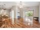 Bright living room featuring hardwood floors and a view of the backyard at 10230 Old Tampa Bay Dr, San Antonio, FL 33576