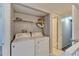 Shared laundry with shelving and hookups at 107 Caldwell Dr # 291, Brandon, FL 33510