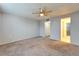 Bright bedroom featuring ceiling fan and ample closet space at 107 Caldwell Dr # 291, Brandon, FL 33510