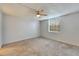 Bright bedroom with window and ceiling fan at 107 Caldwell Dr # 291, Brandon, FL 33510