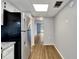 Kitchen with stainless steel appliances and view into living area at 107 Caldwell Dr # 291, Brandon, FL 33510