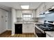 Bright kitchen featuring stainless steel appliances and granite countertops at 107 Caldwell Dr # 291, Brandon, FL 33510