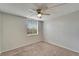 Bright bedroom with neutral walls, carpet flooring, and ceiling fan at 107 Caldwell Dr # 291, Brandon, FL 33510