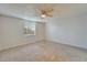 Spacious bedroom with ceiling fan and large window at 107 Caldwell Dr # 291, Brandon, FL 33510