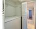 Shelved closet with additional storage at 107 Caldwell Dr # 291, Brandon, FL 33510