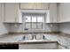 Kitchen sink and granite countertop detail at 107 Caldwell Dr # 291, Brandon, FL 33510