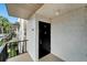 Private entrance to condo unit with black door and number 291 at 107 Caldwell Dr # 291, Brandon, FL 33510