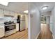 Kitchen with stainless steel appliances and wood flooring at 107 Caldwell Dr # 291, Brandon, FL 33510
