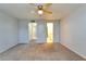 Bedroom with ceiling fan and access to bathroom and closet at 107 Caldwell Dr # 291, Brandon, FL 33510