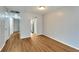 Living room with laminate flooring and view into kitchen at 107 Caldwell Dr # 291, Brandon, FL 33510