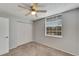 Spacious bedroom with double door closet, neutral walls and ceiling fan at 107 Caldwell Dr # 291, Brandon, FL 33510