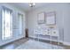 Elegant entryway showcasing a white console table and double doors with glass accents at 12735 Bergstrom Bay Dr, Riverview, FL 33579