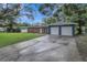 Brick ranch home with attached two-car garage at 12905 N Oregon Ave, Tampa, FL 33612