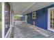 Screened porch with access to backyard at 12905 N Oregon Ave, Tampa, FL 33612