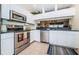 Well-equipped kitchen with stainless steel appliances at 14880 Shipwatch Trce # 1915, Largo, FL 33774