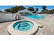 Relax in the community hot tub after a long day at 14880 Shipwatch Trce # 1915, Largo, FL 33774