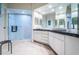 Bathroom with walk-in shower and double vanity at 14880 Shipwatch Trce # 1915, Largo, FL 33774