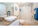 Clean bathroom, featuring a shower/tub combo and granite vanity at 14880 Shipwatch Trce # 1915, Largo, FL 33774