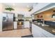 Kitchen with stainless steel appliances and granite countertops at 14880 Shipwatch Trce # 1915, Largo, FL 33774