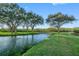 Peaceful waterway with bridge and lush landscaping at 14880 Shipwatch Trce # 1915, Largo, FL 33774