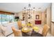 Bright dining area with glass table and wicker chairs at 14880 Shipwatch Trce # 1915, Largo, FL 33774