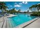 Relaxing pool with plenty of lounge chairs and water access at 14880 Shipwatch Trce # 1915, Largo, FL 33774
