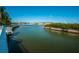 Peaceful waterfront view with lush mangrove landscaping at 14880 Shipwatch Trce # 1915, Largo, FL 33774