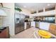 Modern kitchen featuring stainless steel appliances and ample cabinetry at 14880 Shipwatch Trce # 1915, Largo, FL 33774
