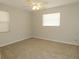 Well-lit bedroom with ceiling fan and carpet at 4201 Dr Martin Luther King Jr N St, St Petersburg, FL 33703