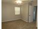 Spacious bedroom with ceiling fan and carpet at 4201 Dr Martin Luther King Jr N St, St Petersburg, FL 33703