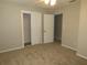 Bedroom with closet and neutral carpeting at 4201 Dr Martin Luther King Jr N St, St Petersburg, FL 33703