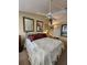 Bright bedroom with a king-size bed and two mirrors at 4632 Red Maple Rd # 1204, Bradenton, FL 34210