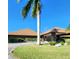 Building exterior with palm trees and landscaping at 4632 Red Maple Rd # 1204, Bradenton, FL 34210